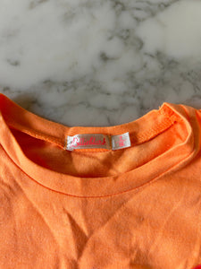 T-shirt orange fluo avec dessins