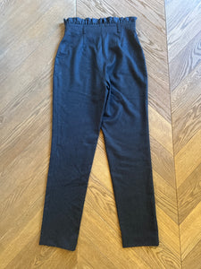 Pantalon Uterque en laine avec volant taille