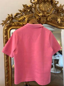 Polo Lacoste rose Neuf avec étiquettes