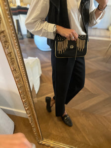 Noémie Lenoir Pochette Carmen Steffens noire et dorée