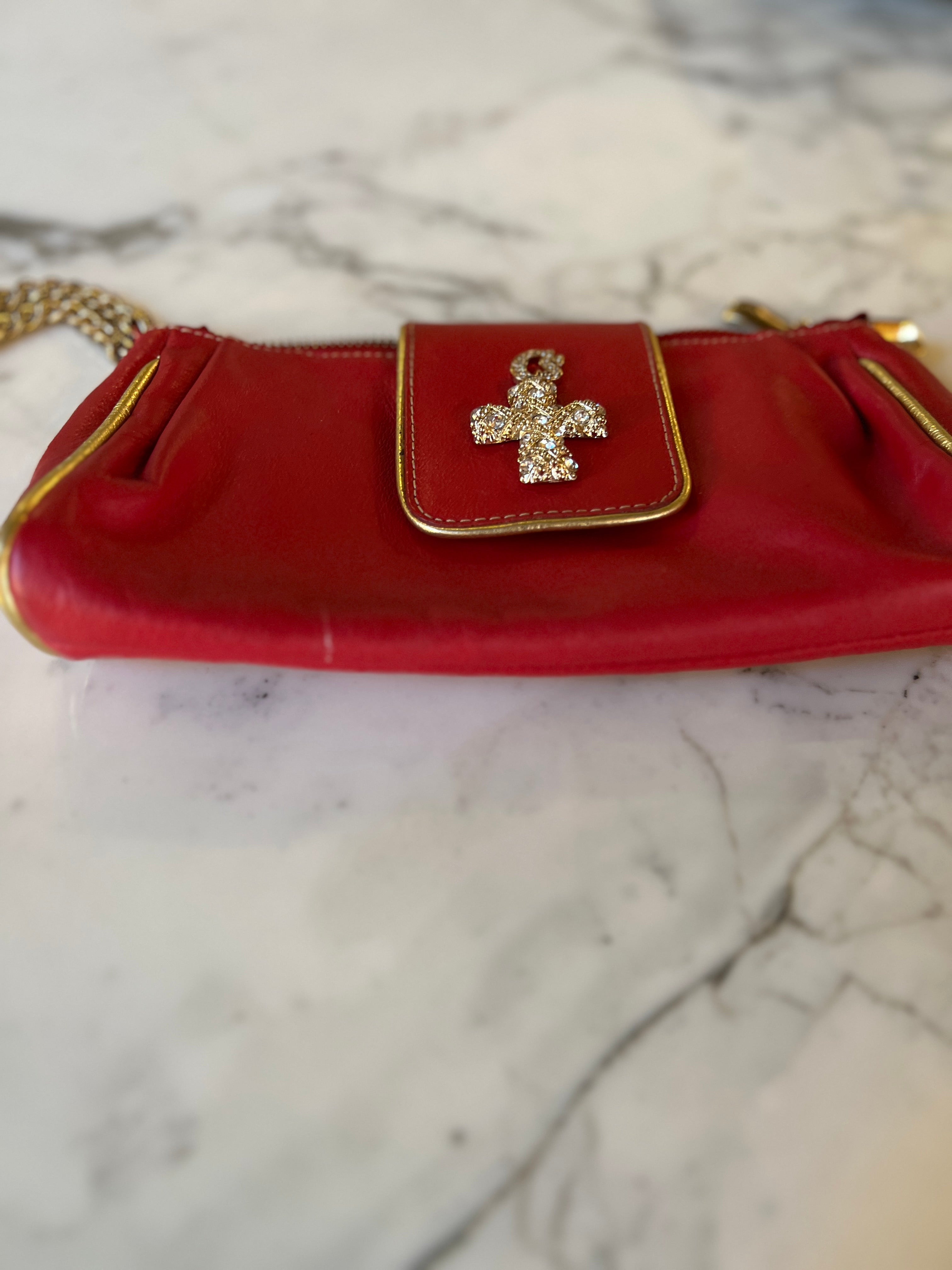 Noémie Lenoir Pochette Carmen Steffens rouge et dorée