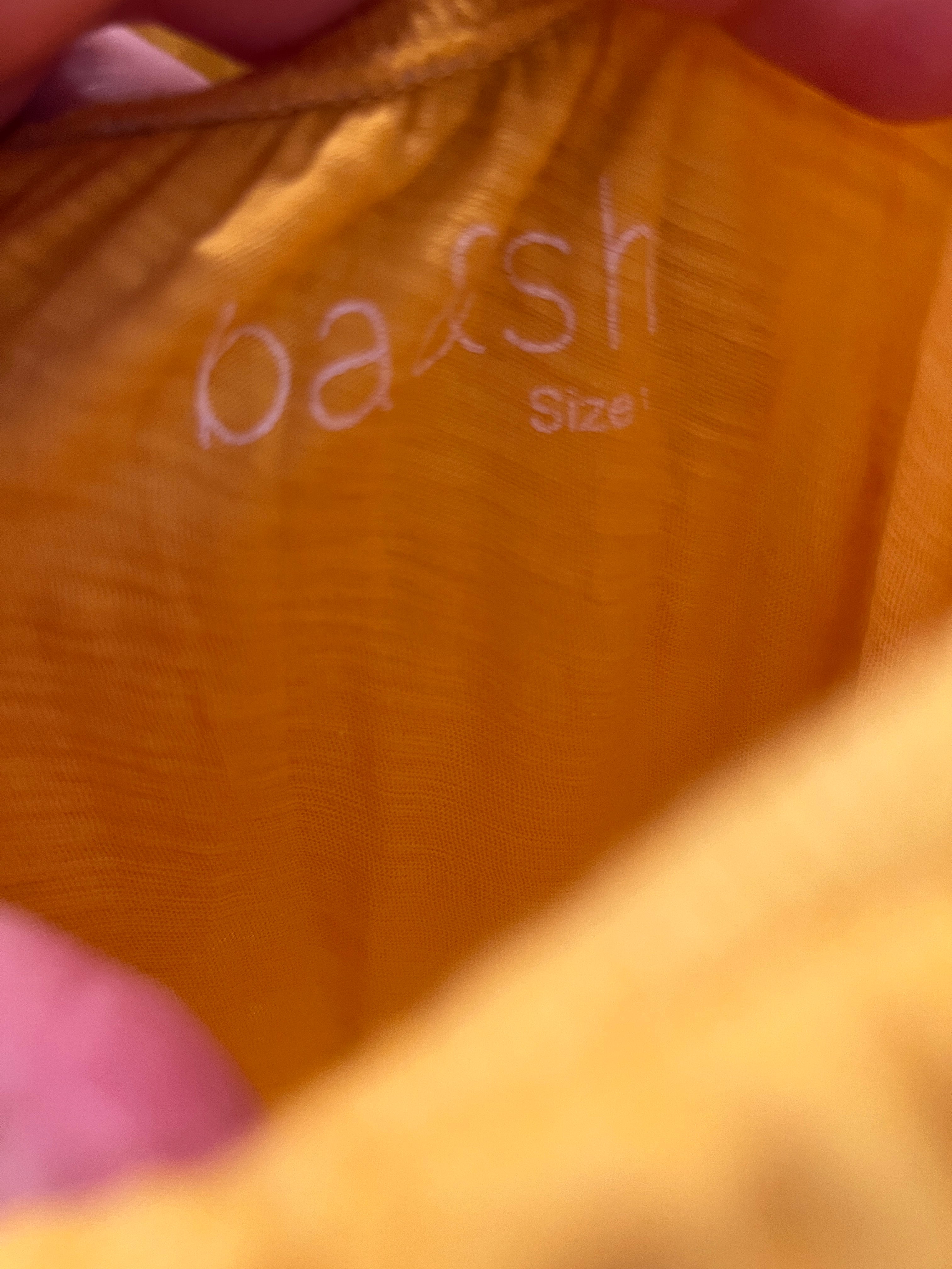 Robe Ba&sh jaune portée épaules