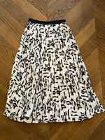 Charger l'image dans la galerie, Jupe Maje plissée blanche et noire
