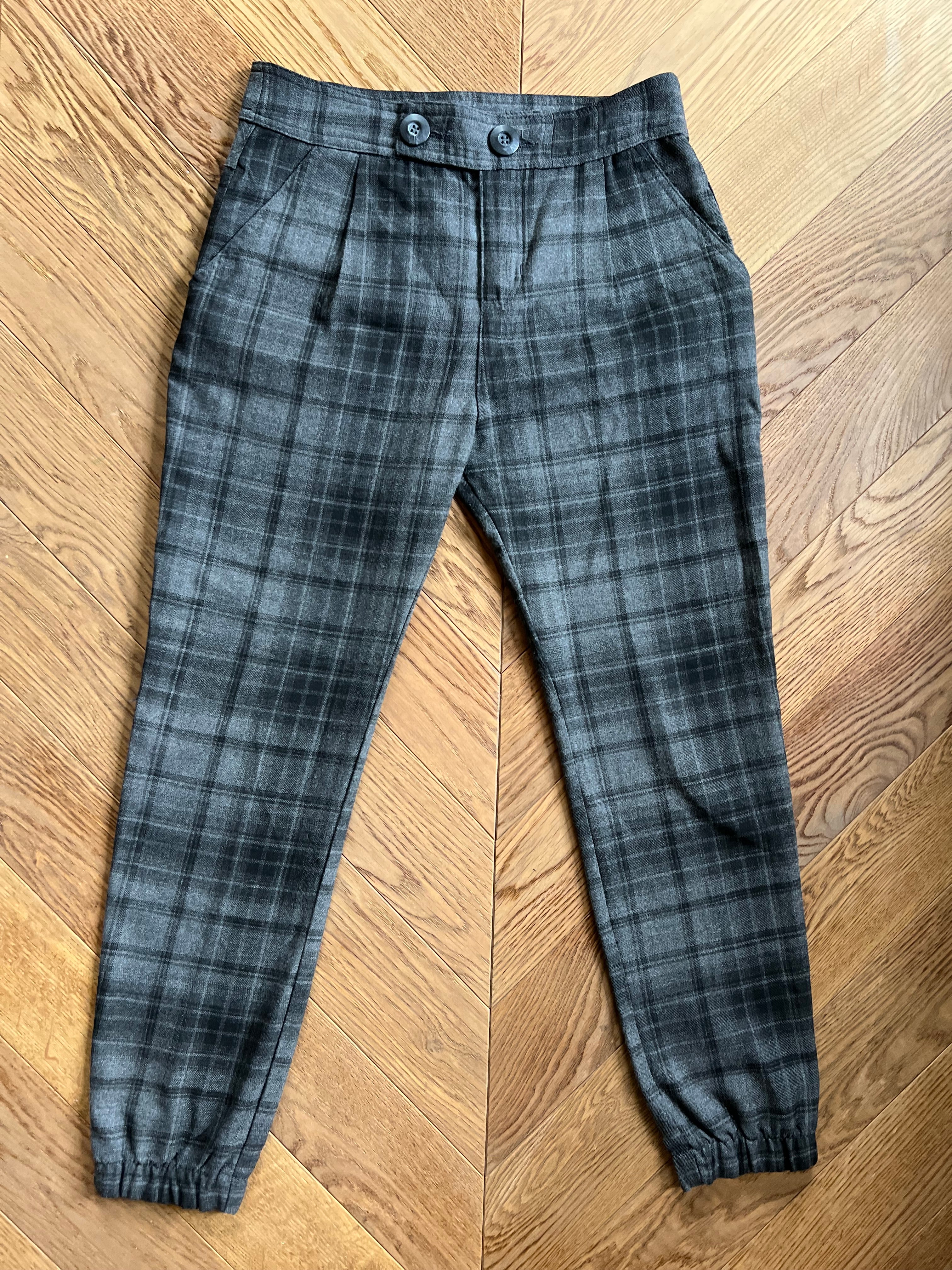 Pantalon Zara à carreaux gris bas froncé